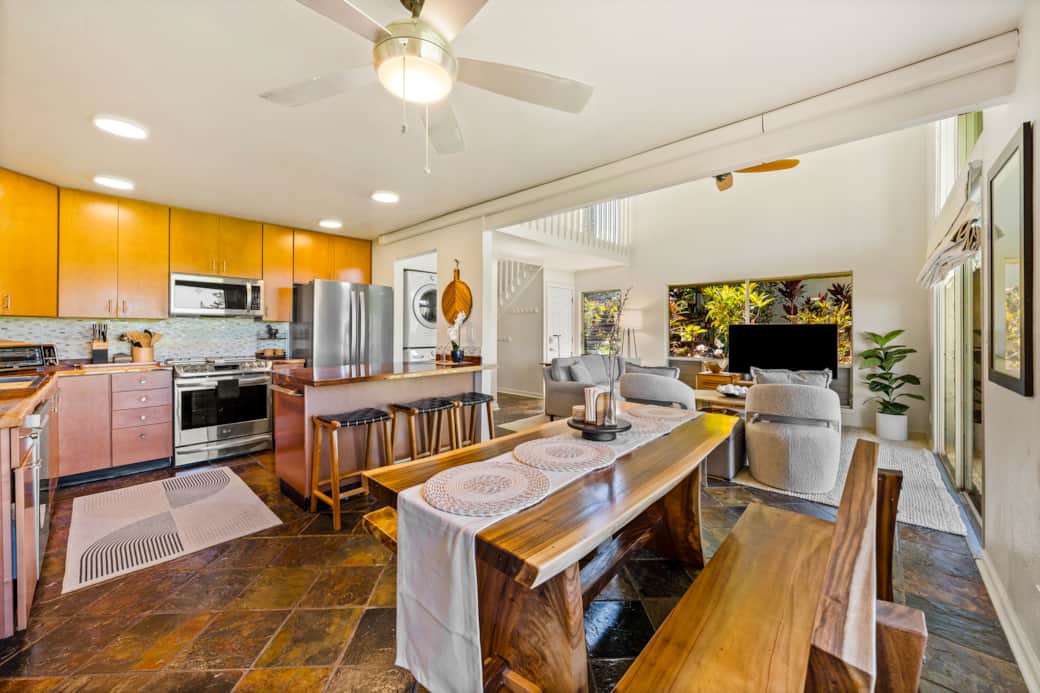 Step into this stunning open-concept kitchen and dining area, where modern design