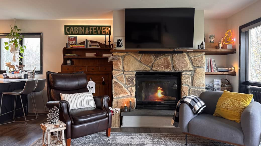 Spacious living room w wood burning fireplace.