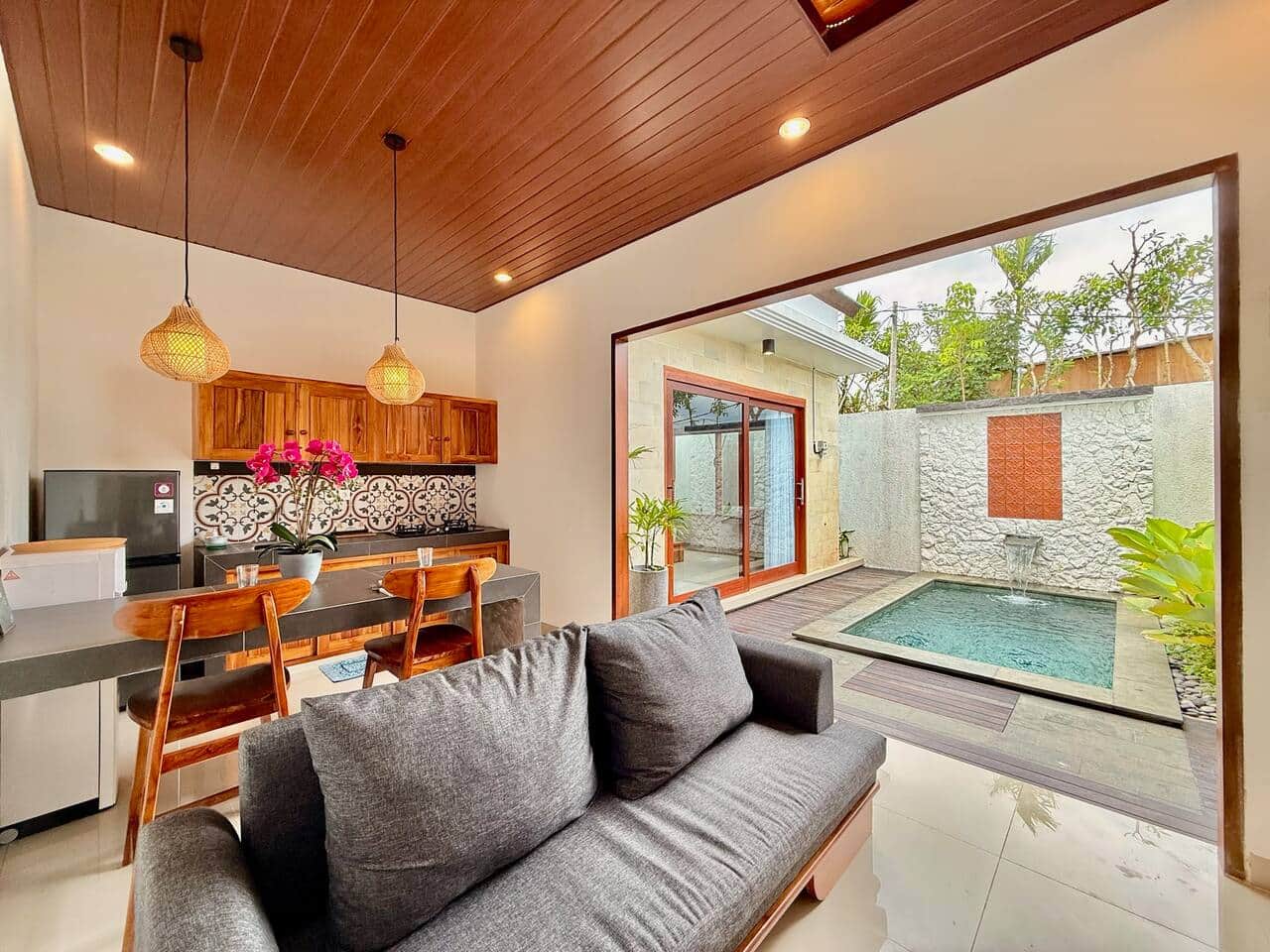 Open tropical living with private pool view