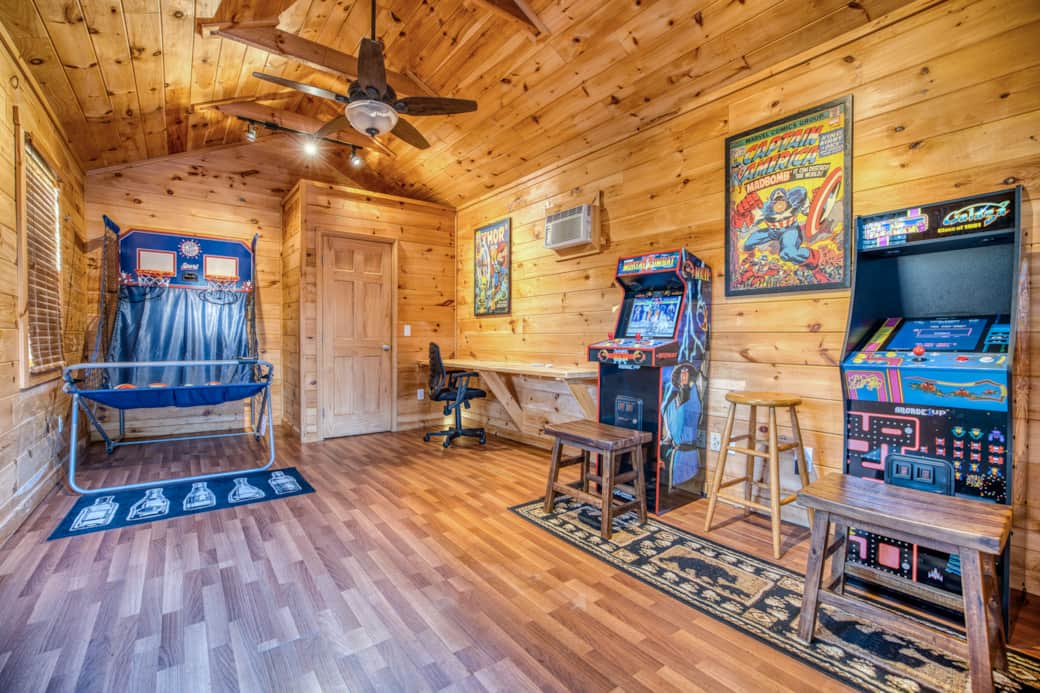 The game room separate from the house allows for some great fun and competition! The game room separate from the house allows for some great fun and competition!