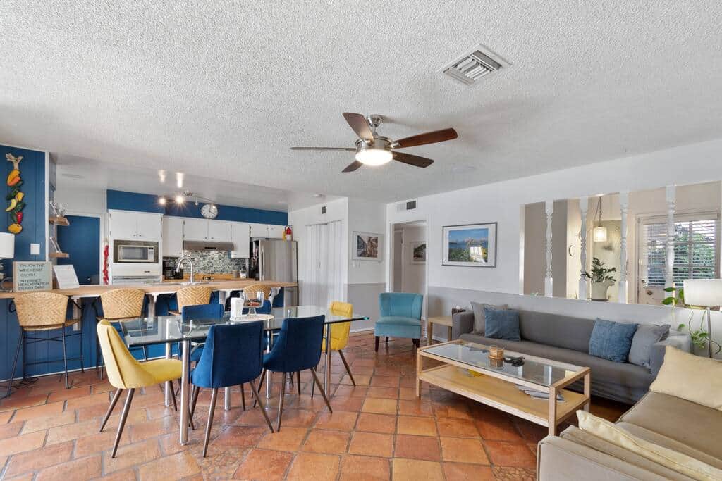 Large living room with full size couch and sleeper sofa. 