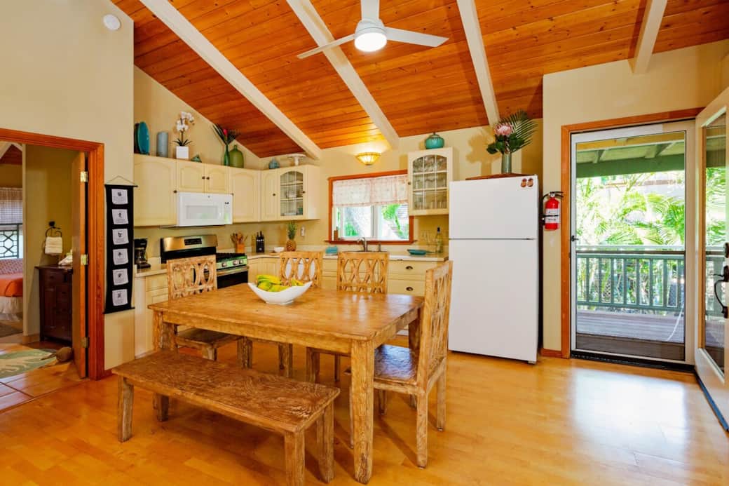 Kitchen and dining table with extra chairs to seat 8