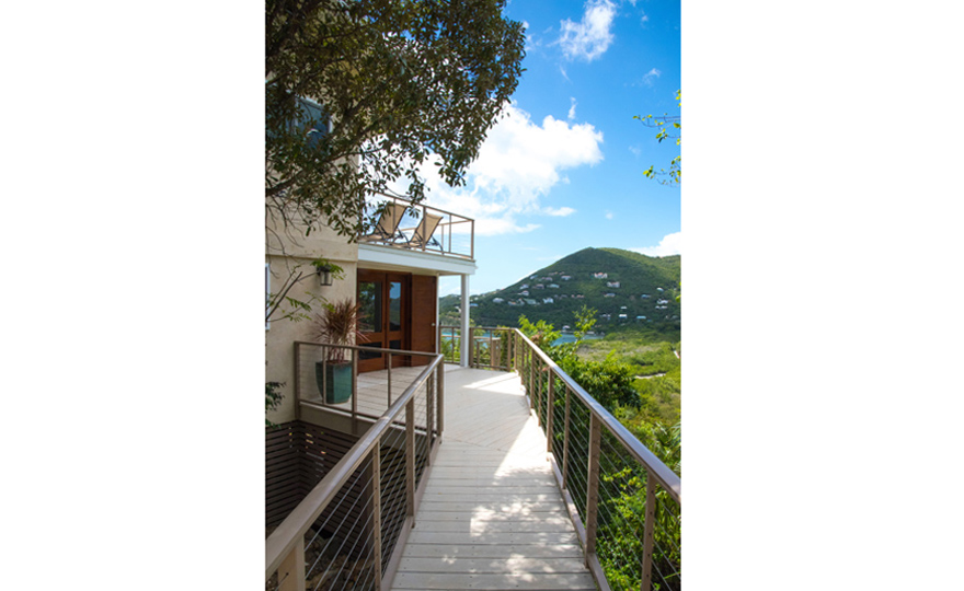 Second exterior side entrance to the lower level screened in porch
