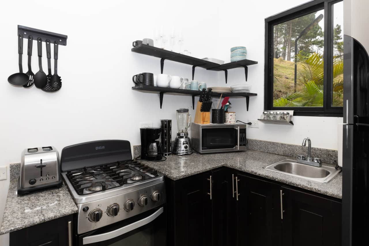 Cook freely in the fully equipped modern kitchen of our off-grid accommodation in Panama.