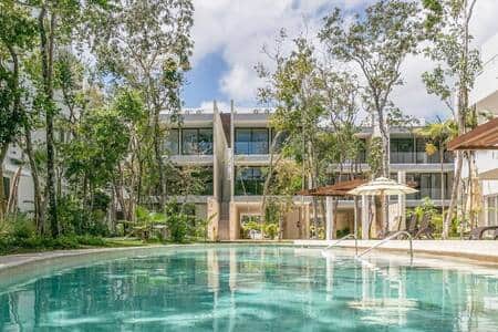 Indulge in luxury at our serene second pool, nestled in a tranquil oasis.