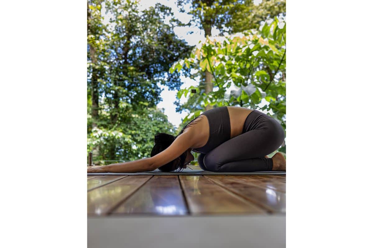 Guest practising yoga at Expansive yoga deck at Villa Sueño.