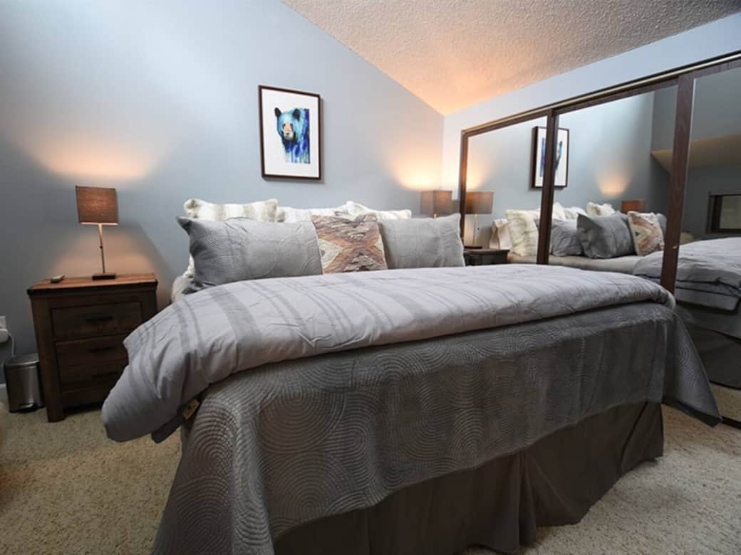 Loft primary suite with vaulted ceilings, a comfy king bed, and soft, luxurious linens ensuring a great night sleep! Loft primary suite with vaulted ceilings, a comfy king bed, and soft, luxurious linens ensuring a great night sleep!