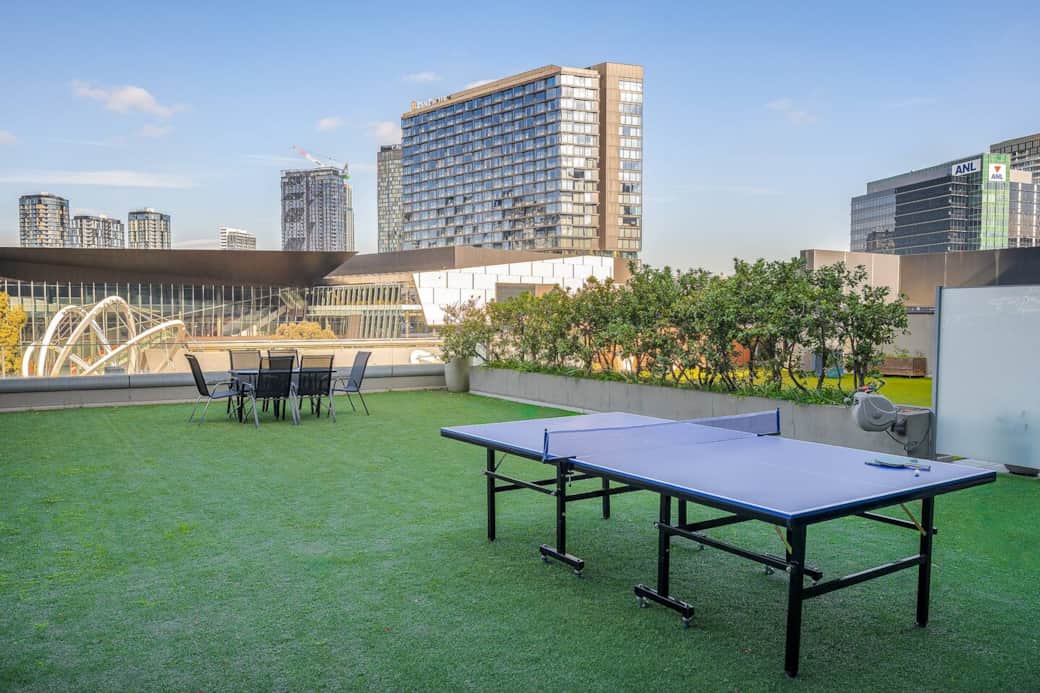 Enormous terrace with ping pong table and outdoor dining table with Yarra River views Enormous terrace with ping pong table and outdoor dining table with Yarra River views
