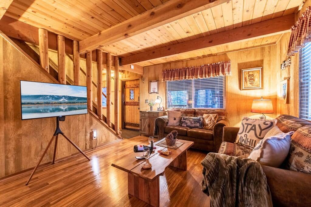 Cozy living room all wood with a large SMART TV