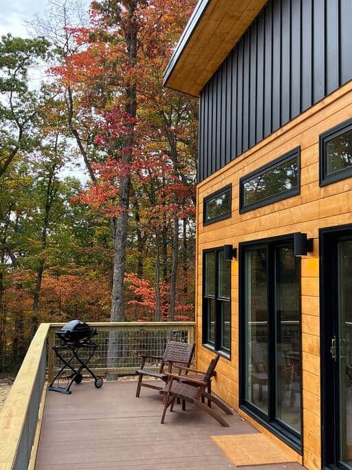 Deck seating and propane grill for the outdoor chef, with expansive views