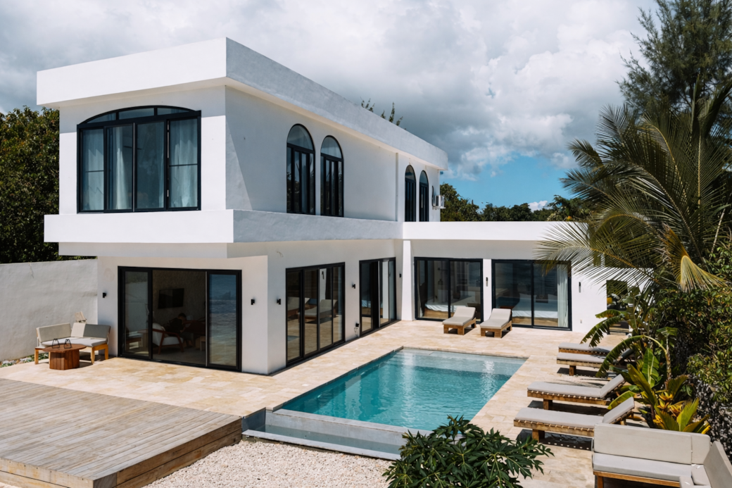 Modern villa exterior with private pool – The Beach House Zanzibar