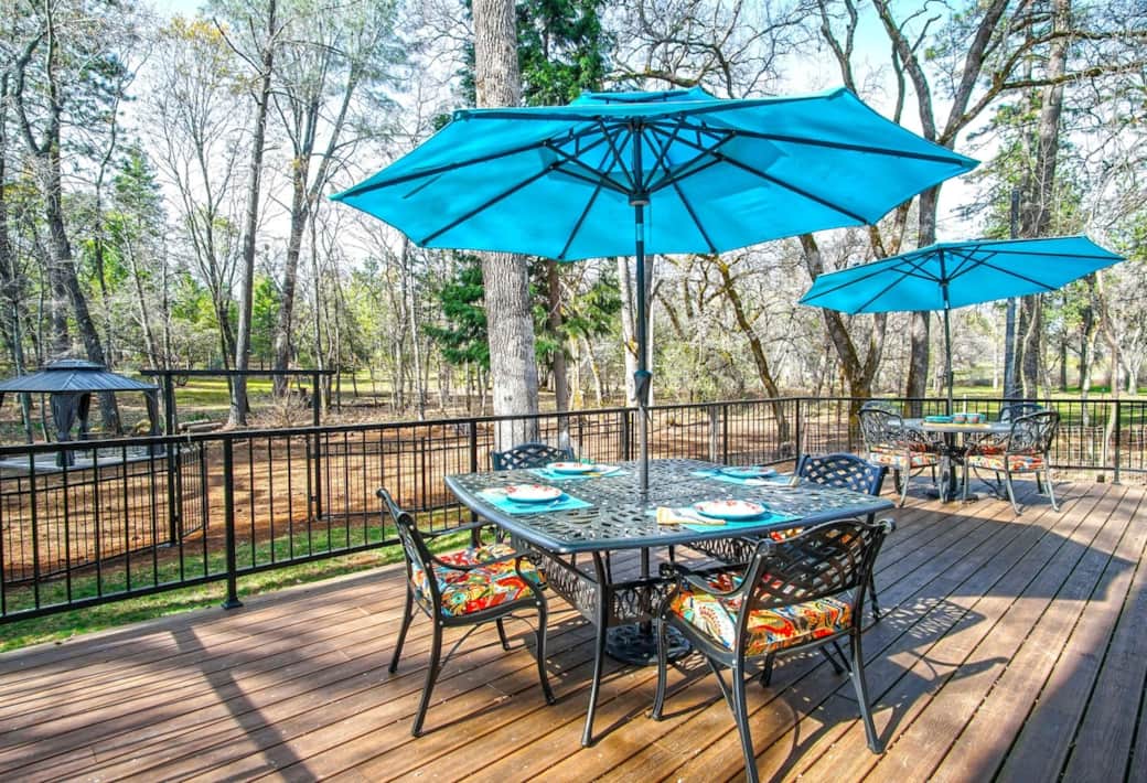 Celebrate in style! Our expansive deck features a BBQ and umbrella-shaded dining. With secure railings and forest views, it’s the ultimate private setting for family meals, birthdays, or anniversaries. Celebrate in style! Our expansive deck features a BBQ and umbrella-shaded dining. With secure railings and forest views, it’s the ultimate private setting for family meals, birthdays, or anniversaries.