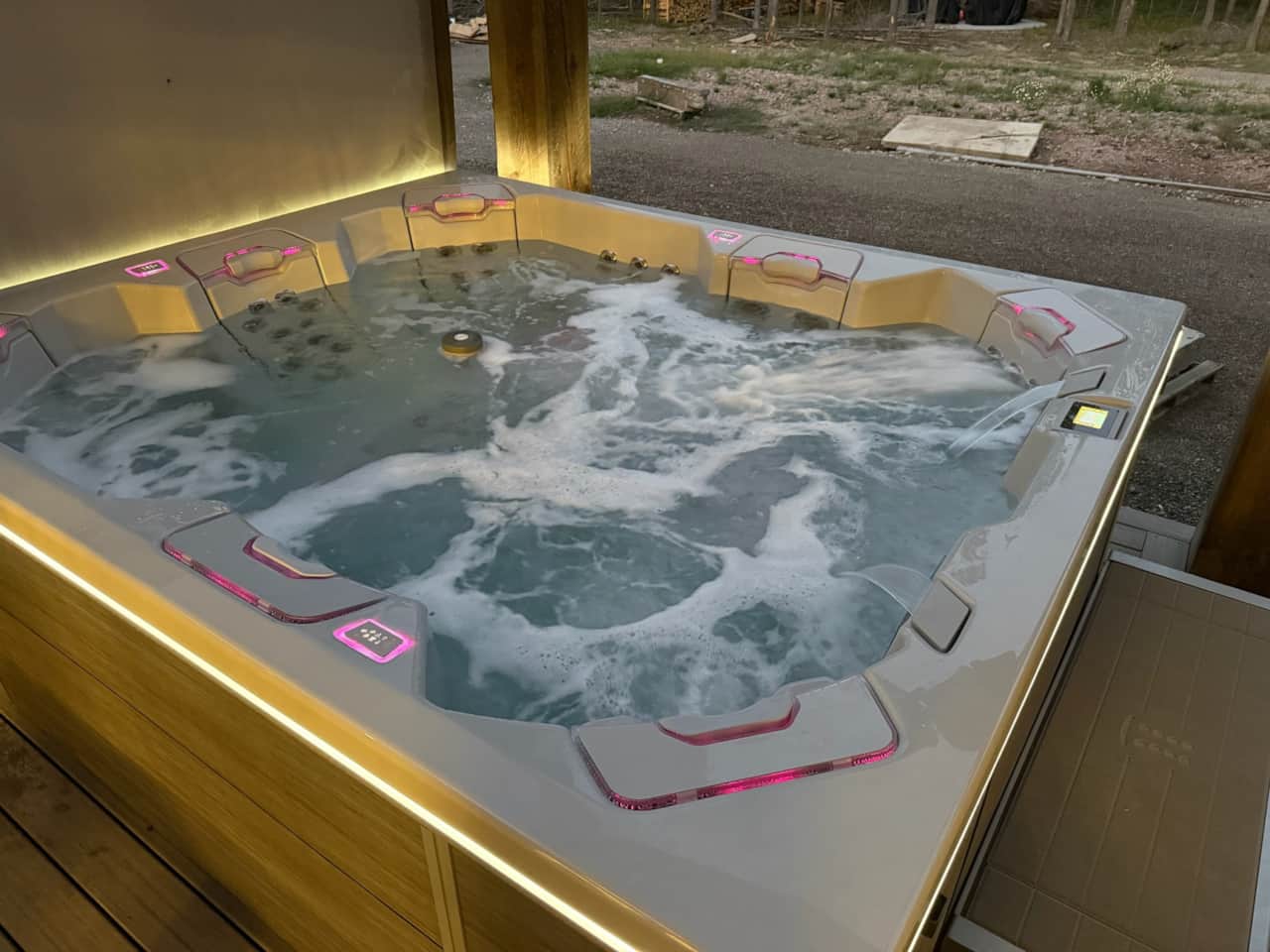 Unwind in the private hot tub after a day of adventure