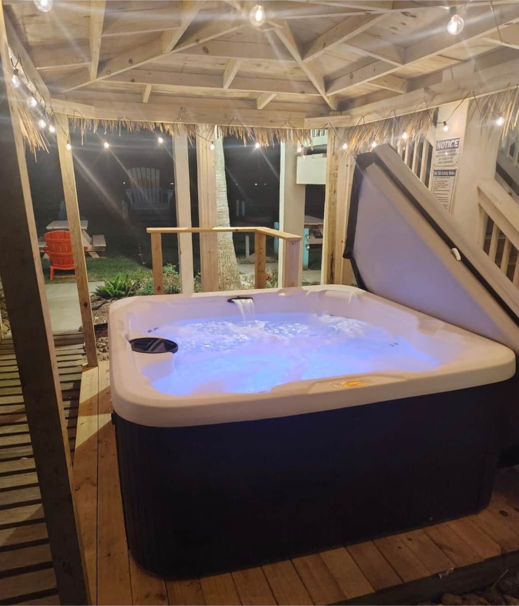 Private hot tub for relaxing after a day at the beach!