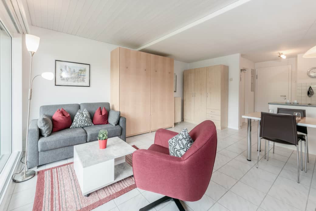 Wohnbereich mit Schrankbett Wohnbereich mit Schrankbett