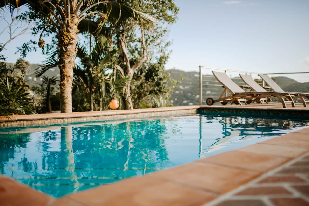 Private saline pool surrounded by tropical gardens