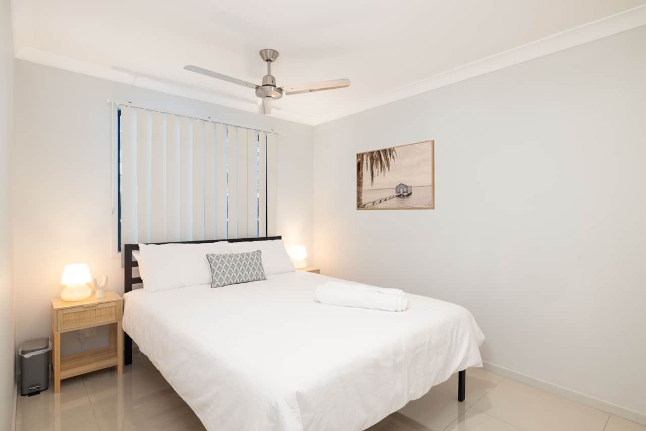 Bedroom 1: Peaceful bedroom with cozy design and ample storage