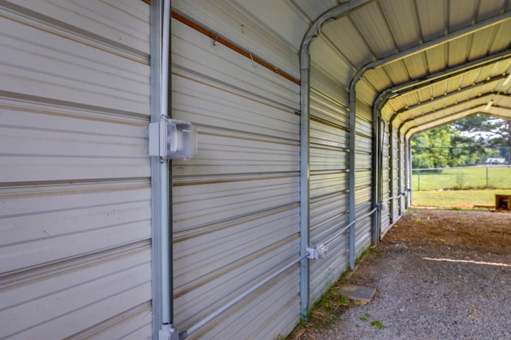 Covered Parking has overhead lighting and outlets. Covered Parking has overhead lighting and outlets.