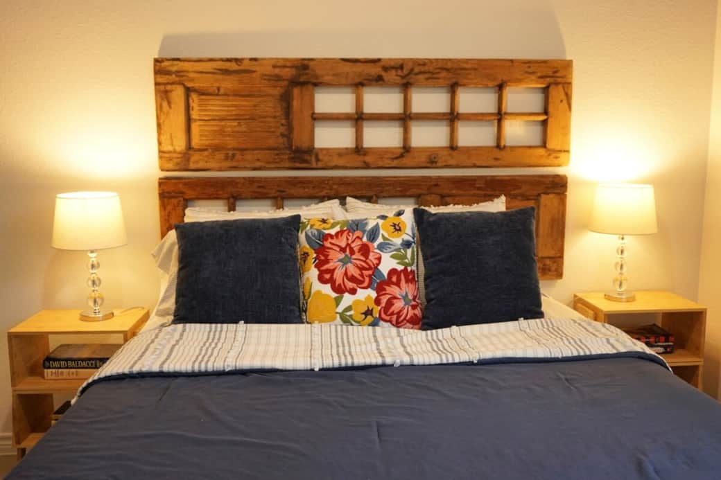 Queen bed with closet and luggage rack. 
Bathroom across the hall