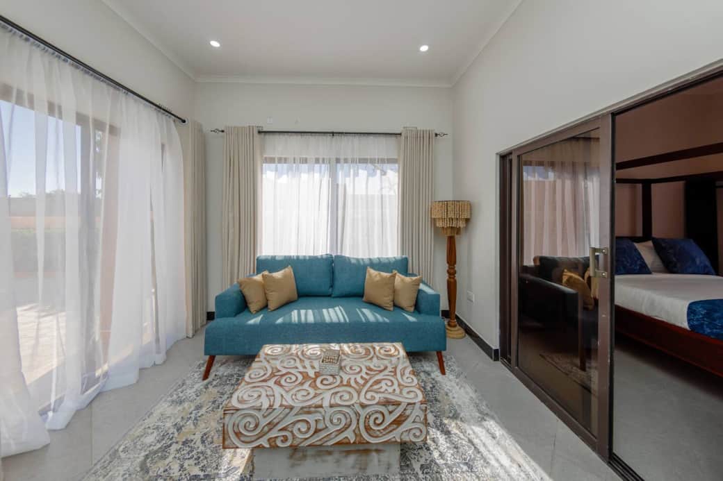 Bright studio living area with comfortable seating