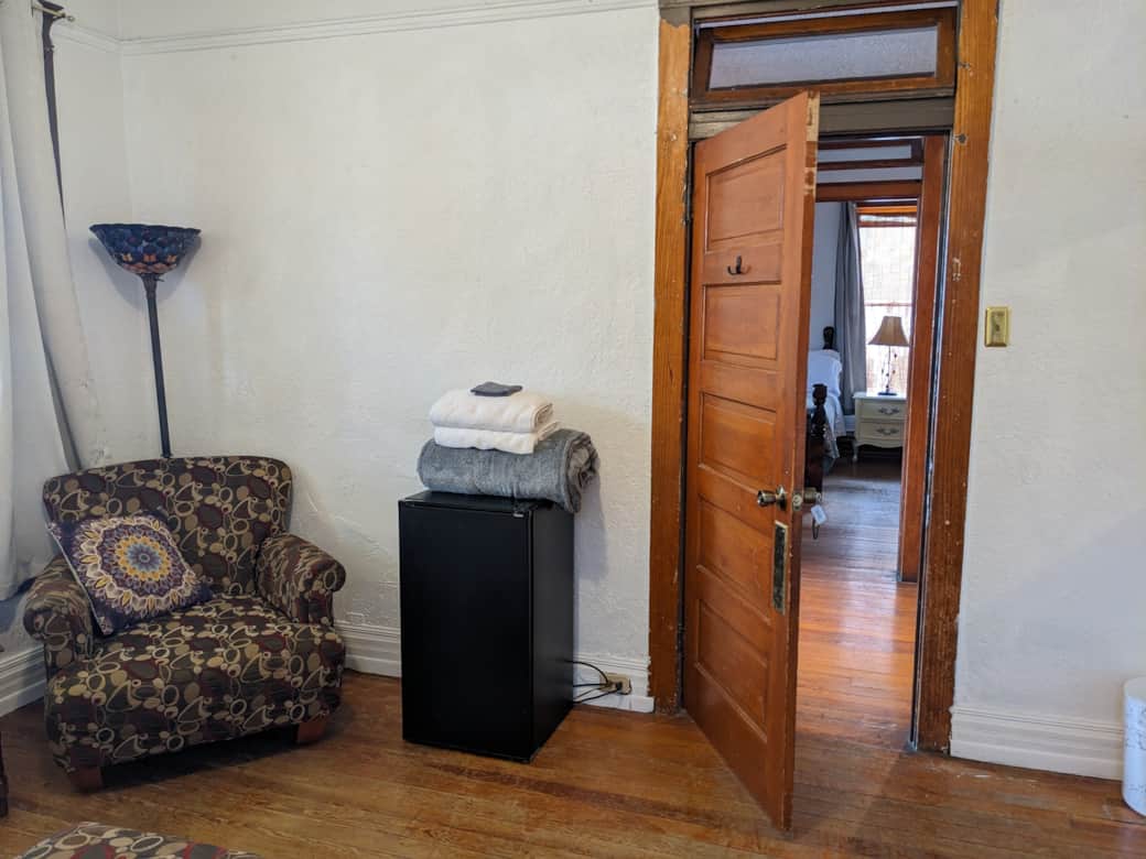 Room 1 chair and fridge