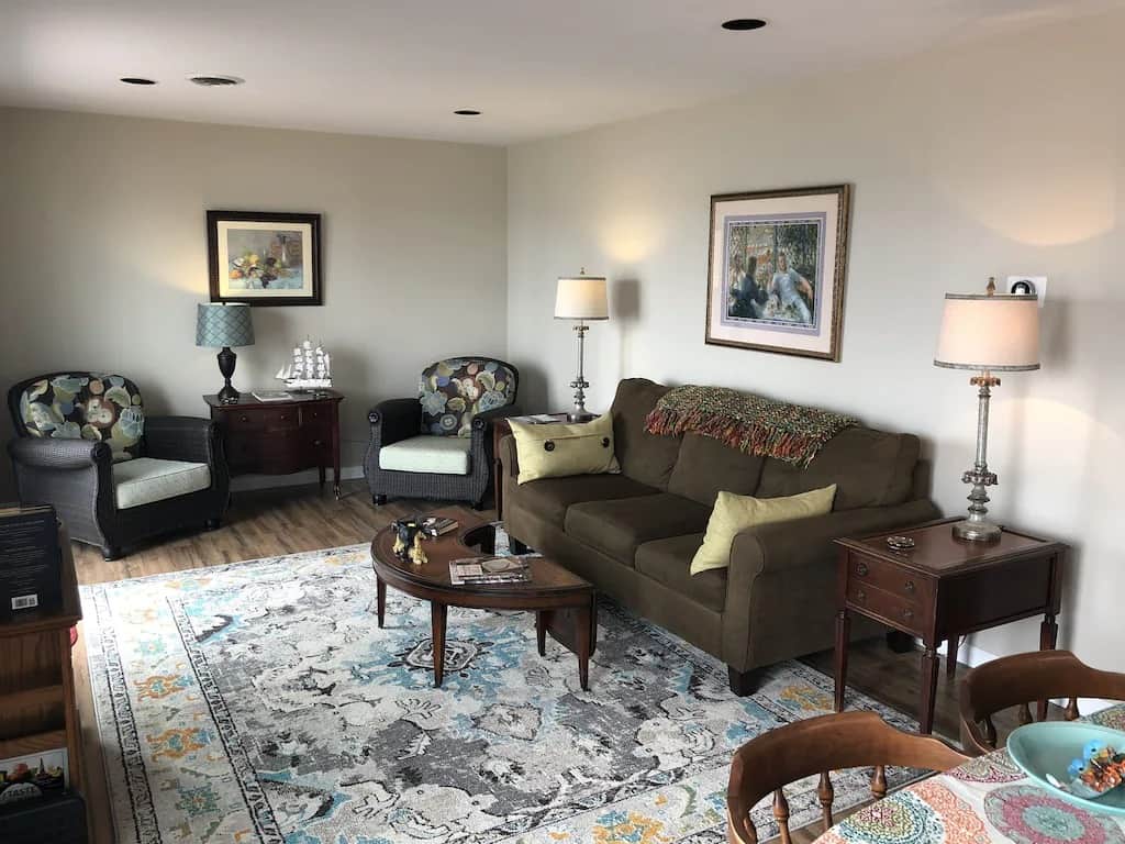 Living room with queen sofa bed and lake views