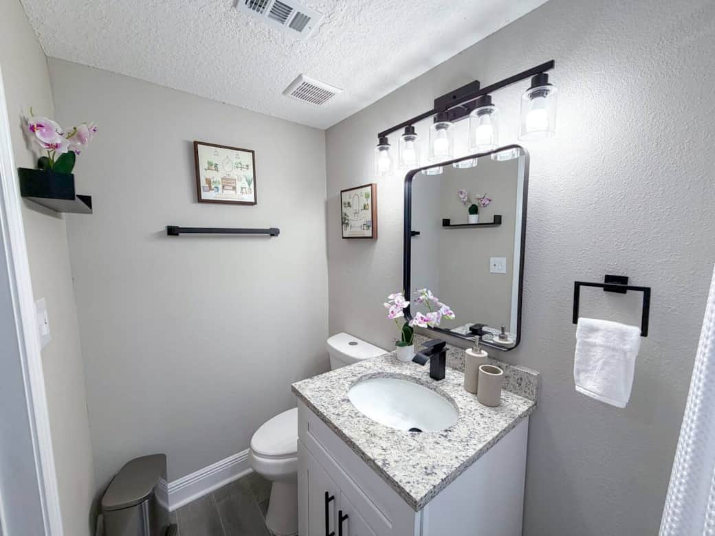Shared full bathroom upstairs. Stocked with body wash, shampoo, and conditioner. Unwind after a day of exploring with a relaxing shower.