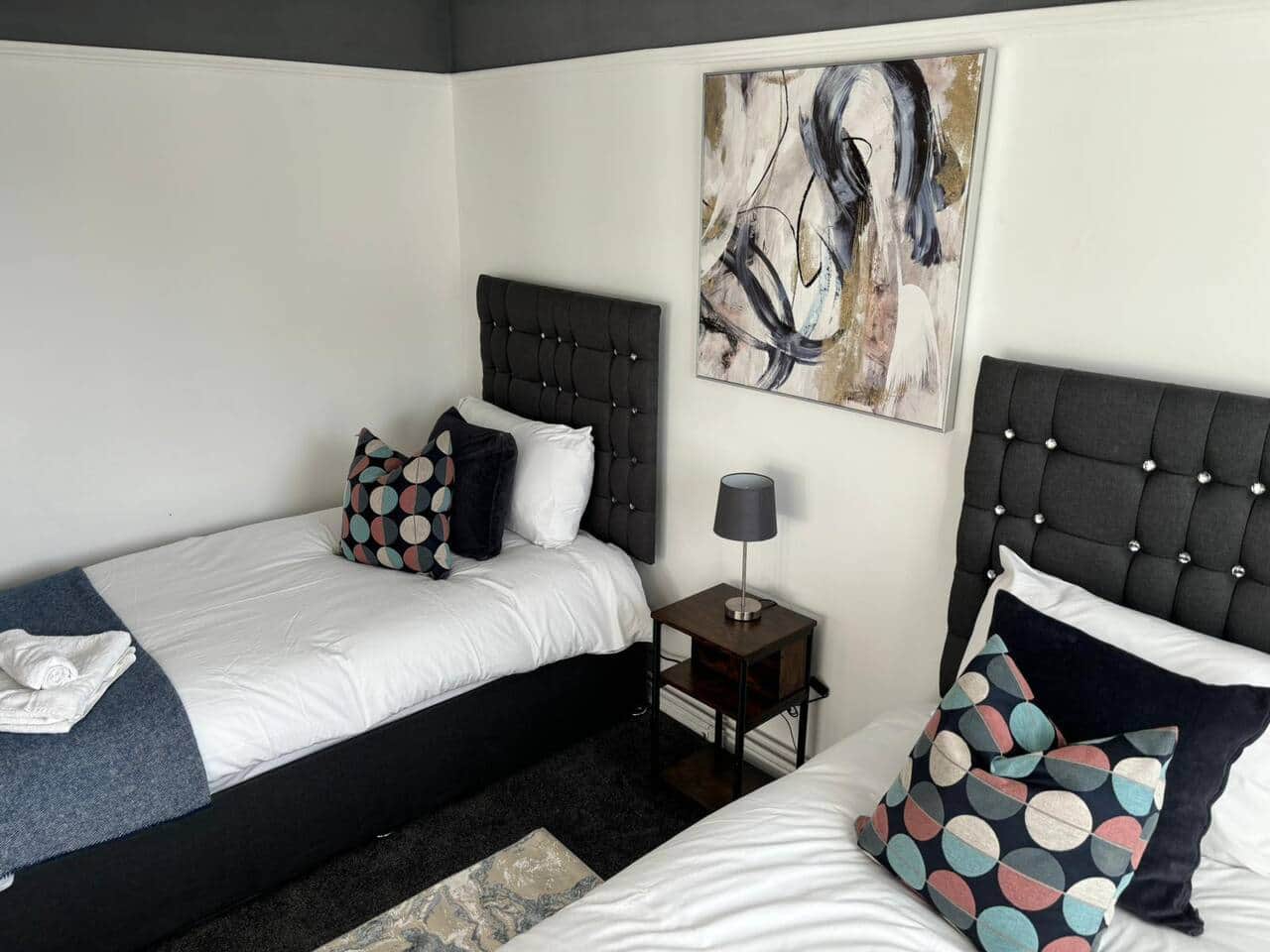 Unwind in our cozy and comfortable bedroom, perfect for a restful night's sleep. Book your stay now!