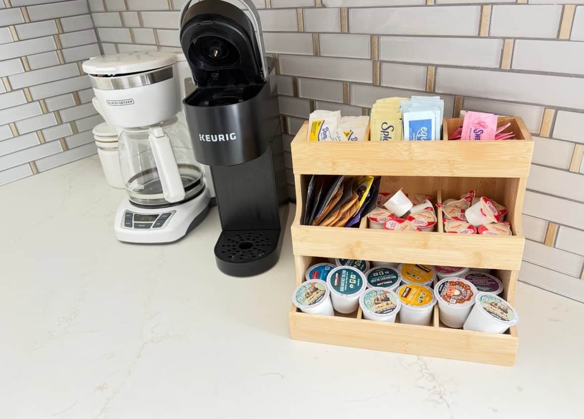 Kitchen pantry setup with coffee, tea, spices, and essentials for guest use