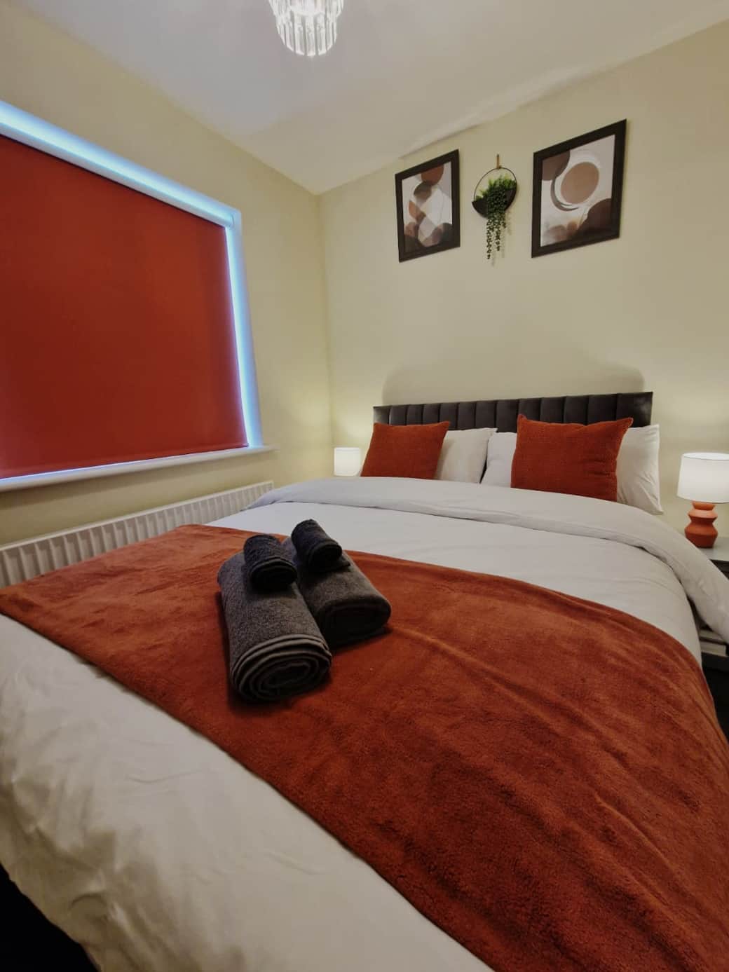 Plush bedding complemented by bright, welcoming colours.