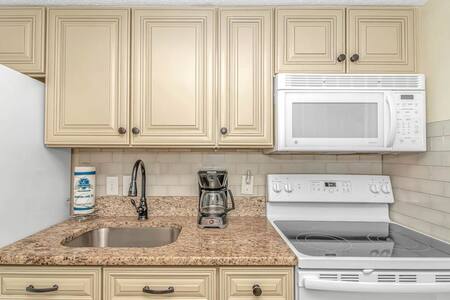 Kitchen Area w/ Ample Cabinet Space