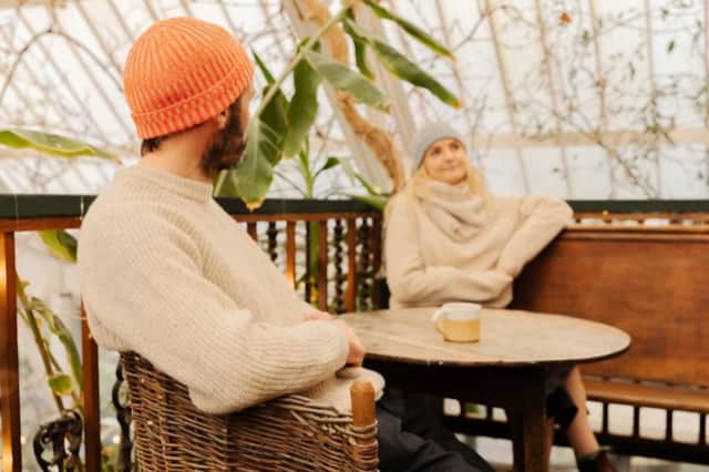Visitors enjoying the café seating area at Eas Fors café and knitwear studio