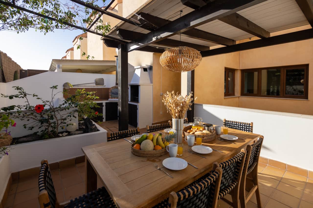 Terrace with dining area, barbeque and pizza oven at your holiday villa Fuerteventura