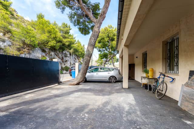 The gated private car park at the property