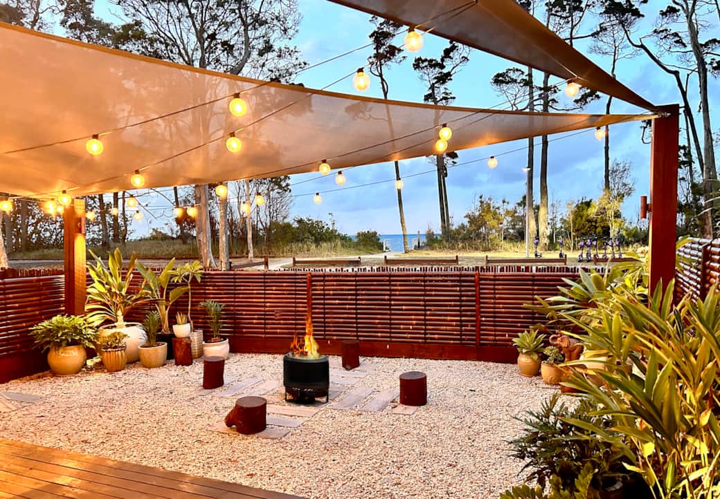 Front garden, ocean views. Enjoy the fire pit on cooler nights.