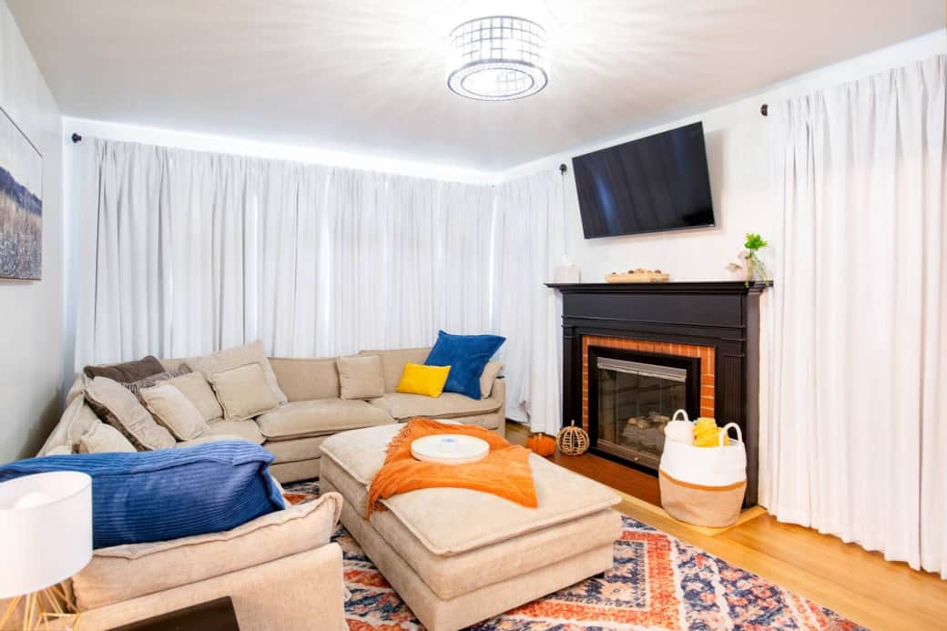 Sink into the oversized sectional, its cushions soft and inviting, wrapping you in comfort as you settle in. Enjoy a nice bowl of popcorn and watch a movie or enjoy a glass of wine by the gas log fireplace!