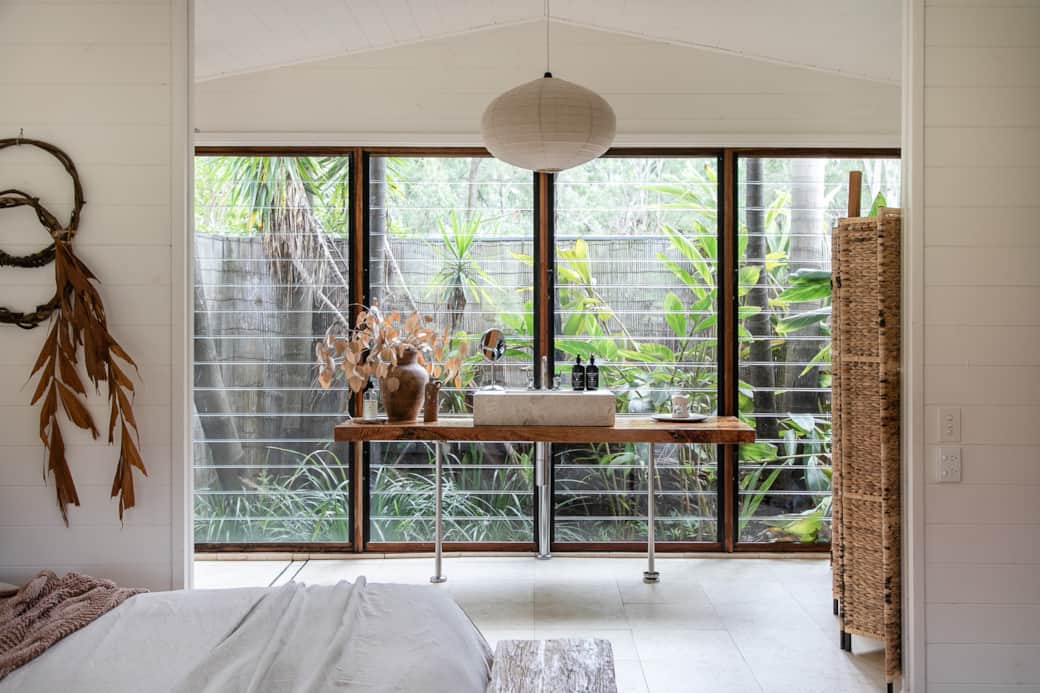 The boathouse bathroom opens into a private rainforest garden The boathouse bathroom opens into a private rainforest garden