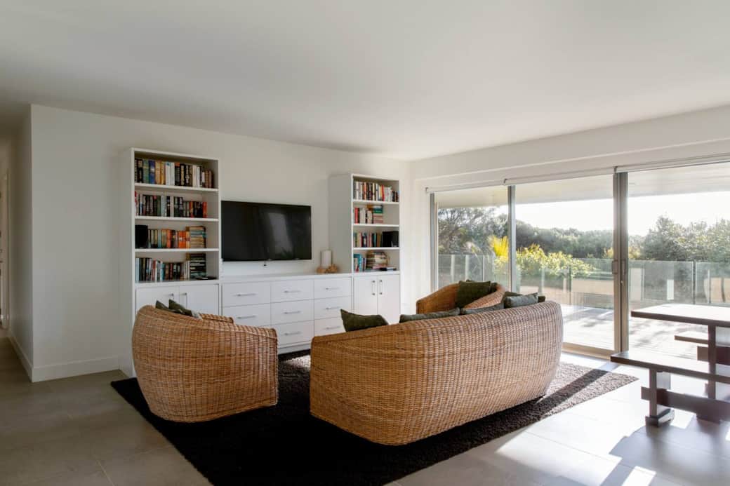 Downstairs features a spacious living area, ideal for teens who want to chill out