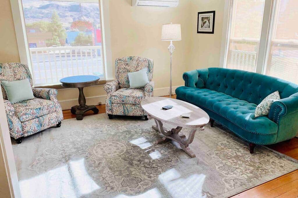 Living Room with French Country sofa and two reclining chairs. Living Room with French Country sofa and two reclining chairs.