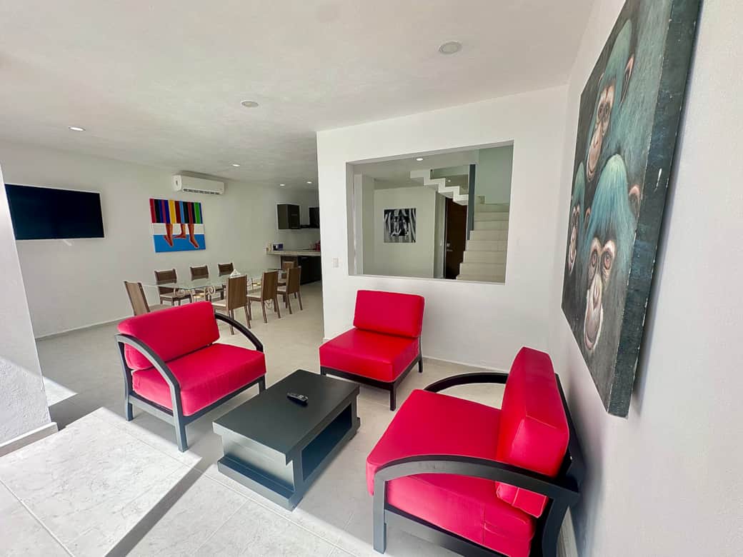 Open living space: living room, kitchen, dining area and patio 