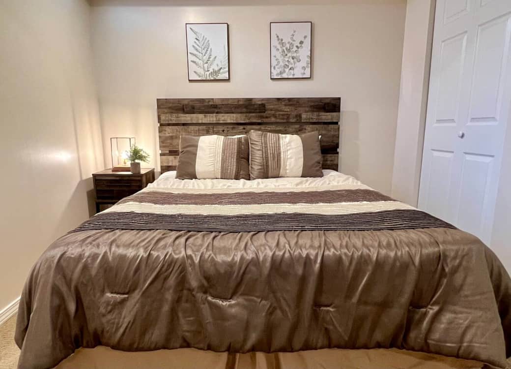 Queen bed in basement with two closets and lots of space Queen bed in basement with two closets and lots of space