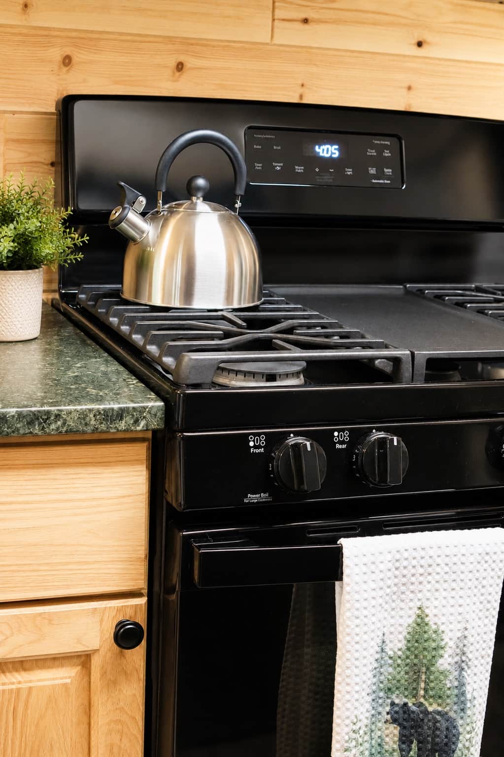 Fully equipped kitchen with gas range.