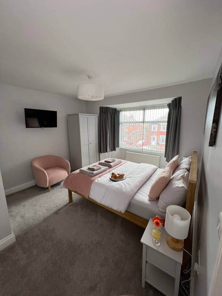 Large front bedroom with blackout curtains to make sure you have a good nights sleep.