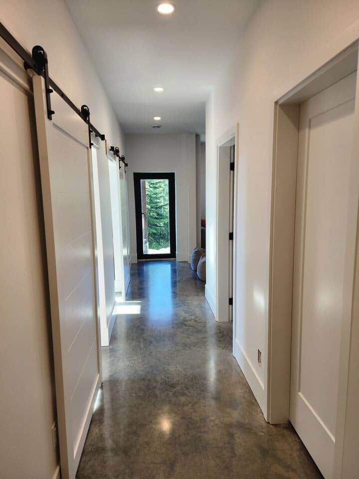 Hallway to bedrooms, sauna and laundry. 