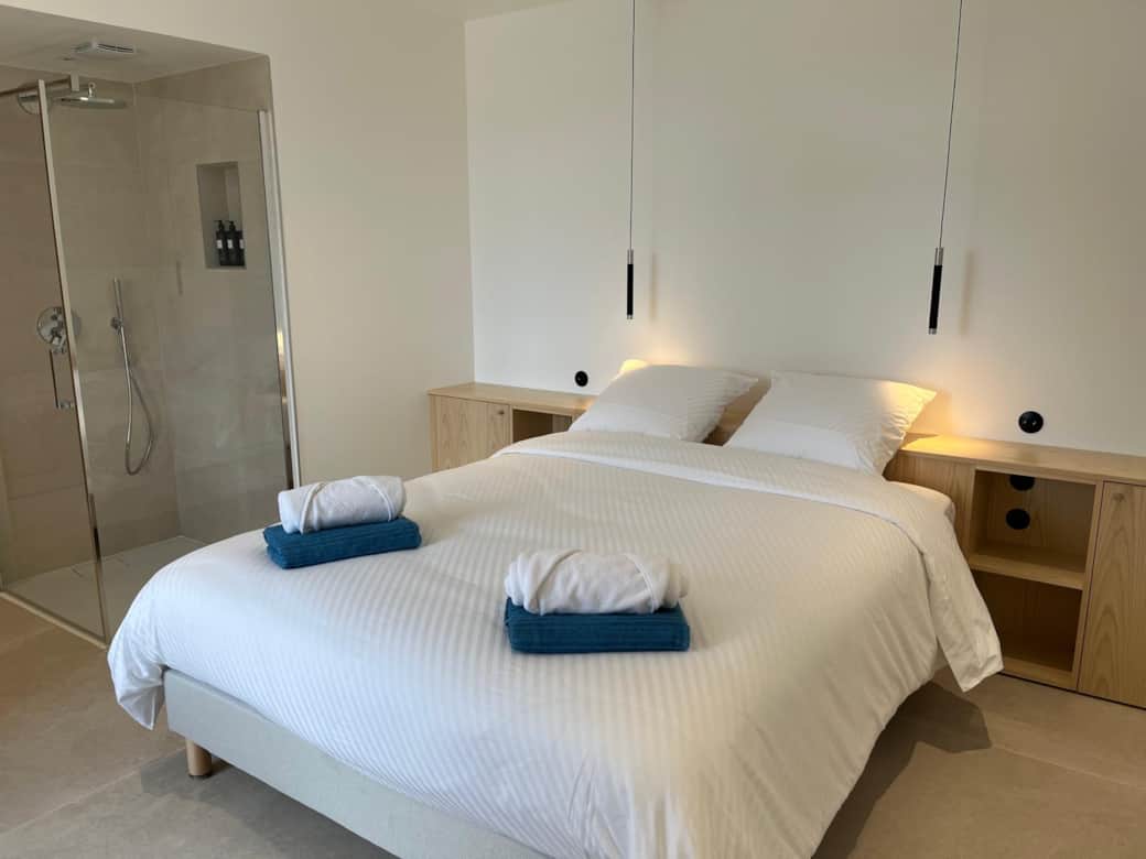 Room with open bathroom