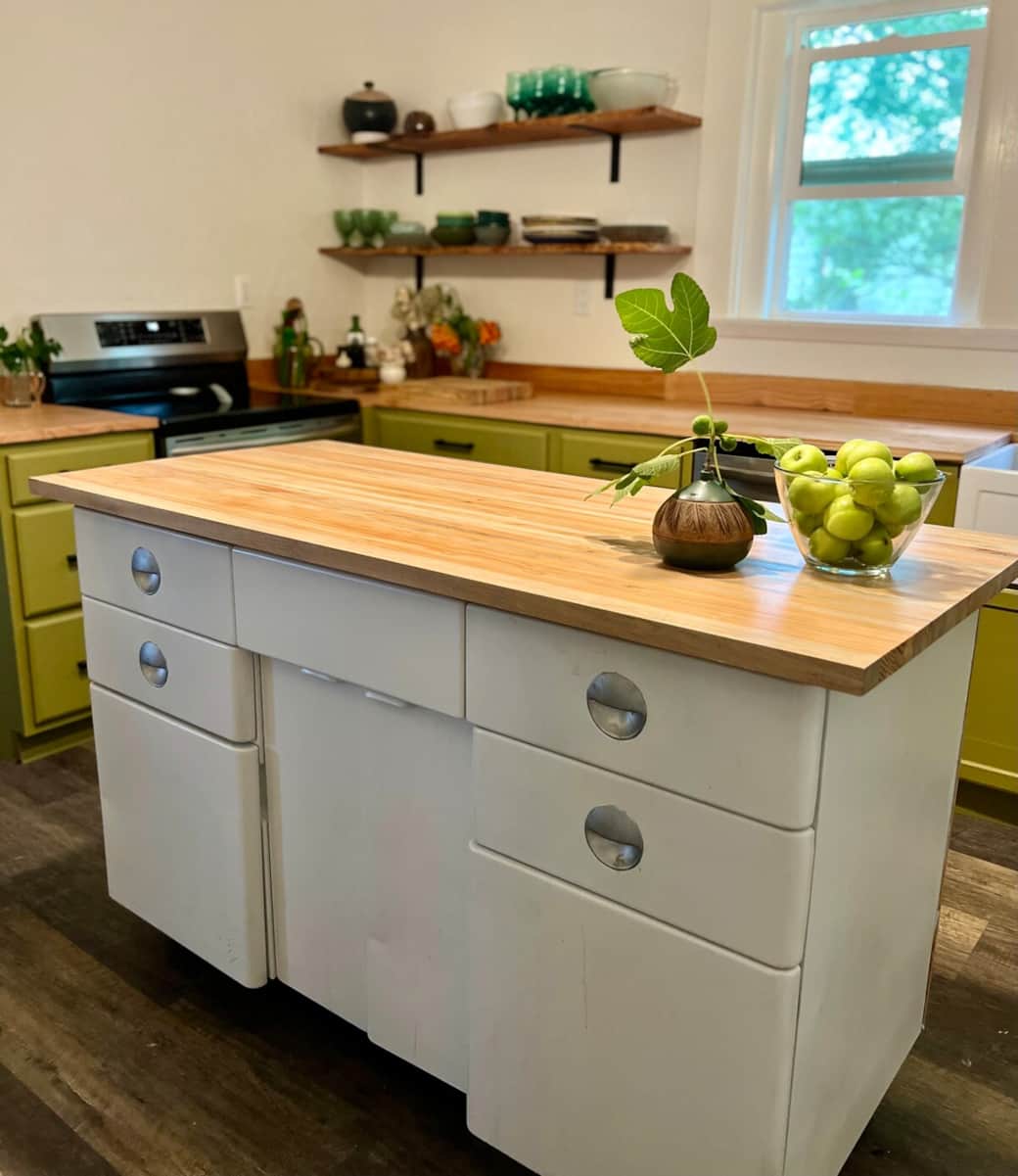 Overlooking the creek and trees, the kitchen offers a quiet connection to nature while you cook or enjoy your morning coffee.