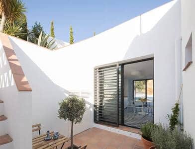 The private couryard lining the kitchen living area to the private roof level pool...