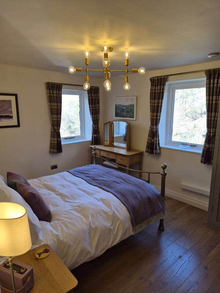 Light-filled bedroom with calming views