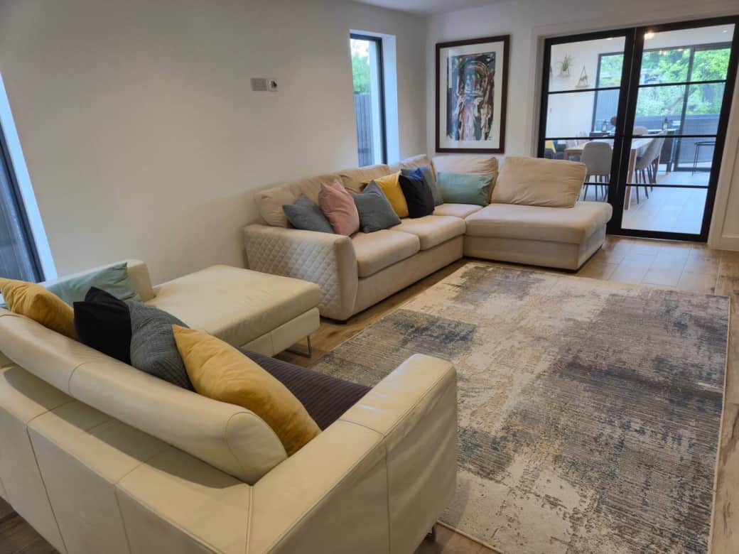 Living room with 2 Corner Sofas including 1 sofa bed. Smart TV with SKY and Netflix  available to use. 