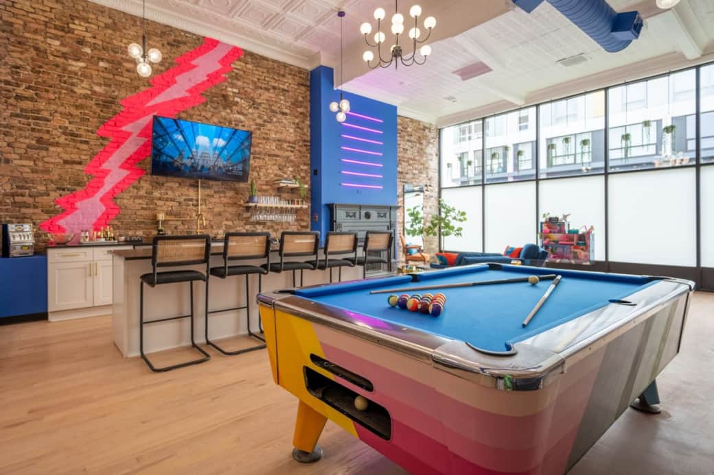Enjoy YouTube TV or Netflix while shooting a game of pool